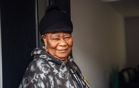 Janet at Dalton Avenue smiling for the camera