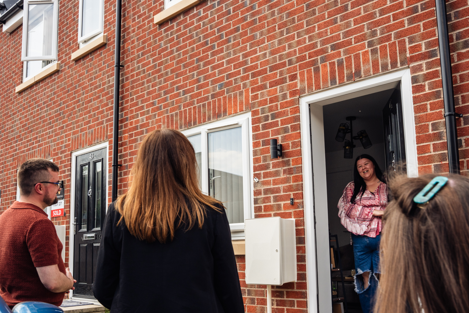 Resident chatting from doorway
