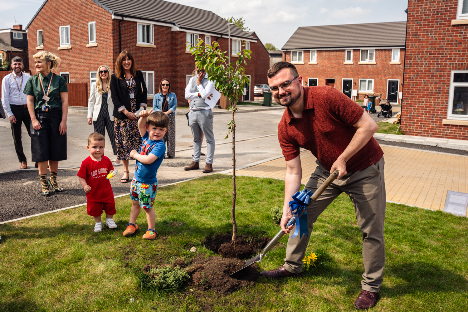Councillor Meredith plants a tree at Townley Gardens