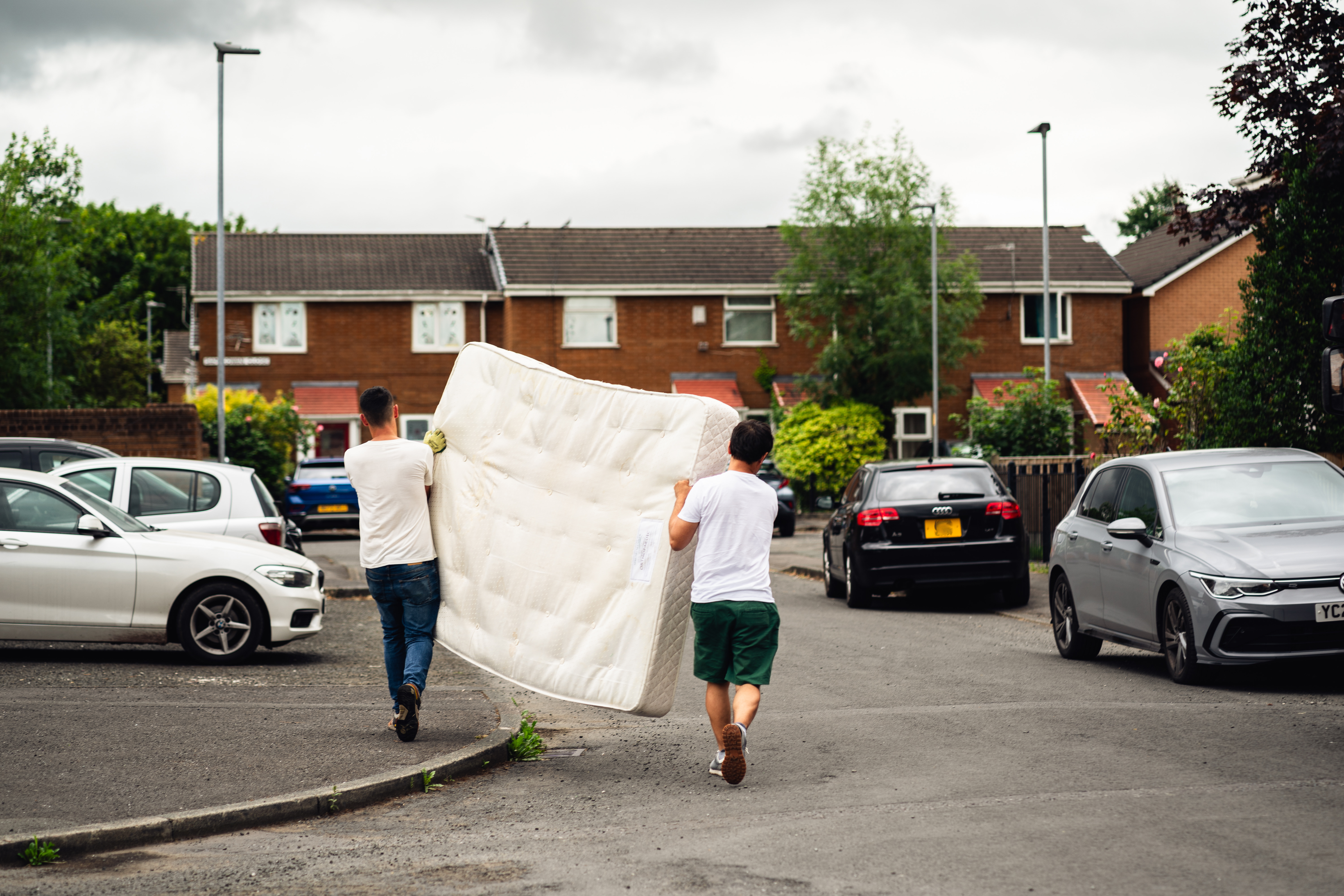Men carrying sofa