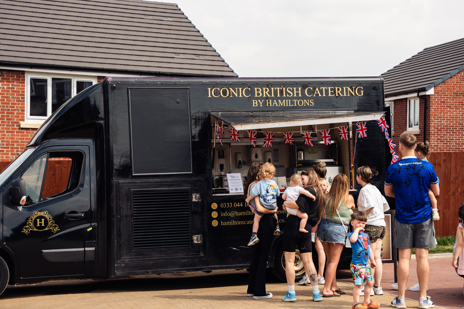 Residents queue for fish and chips from van